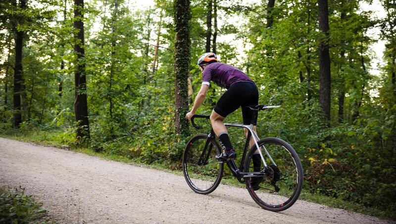 Riding bike on hills to gain more momentum and achieve desired average cycling speed