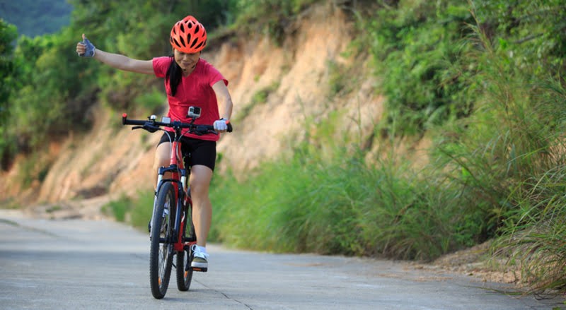 Helping cars overtake bike hand signal