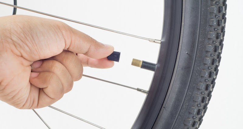 remove the dust cap from the schrader valve